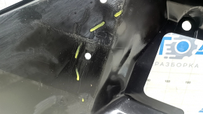 The rear right underbody protection of Toyota Camry v70 18-24 hybrid is dented