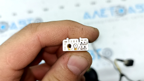 Wiring for the number plate light in the tailgate of Hyundai Tucson 25-26