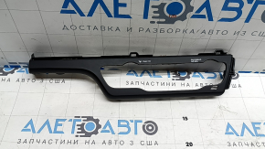 The front panel trim, climate control frame, Kia Niro 17-17, is black, covered in glue, has nicks and scratches