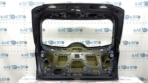 The trunk door is bare Hyundai Tucson 22-26 Korea electric, blue PS8, dented