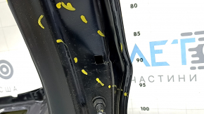 The trunk door is bare Hyundai Tucson 22-26 Korea electric, blue PS8, dented
