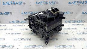 The bare heater housing of the Hyundai Tucson 25-26 1.6T HEV air conditioner without radiators and actuators