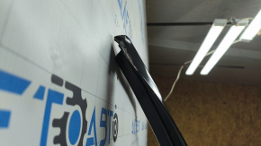 The front right door of a Nissan Rogue 14-20 is bare, the glass frame is bent