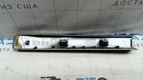 The rear left roof rail cover for a Kia Niro 17-22 is gray and the paint is peeling off