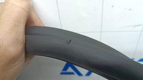 The rear right door opening seal for Audi A3 22-26 is torn and worn