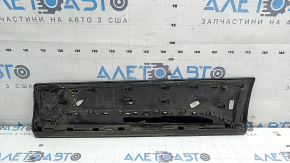 The lower rear right door trim of the Audi Q5 80A 21-25 is painted, after repair, cracked