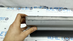 The lower rear right door trim of the Audi Q5 80A 21-25 is painted, after repair, cracked