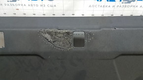 The rear shelf of the Audi A3 22-26 is black and melted