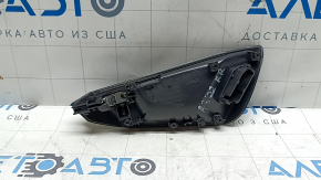 The inner rear right door handle of an Audi A3 22-26 is black, with a plug, scuffs, chrome is peeling, the mount is broken