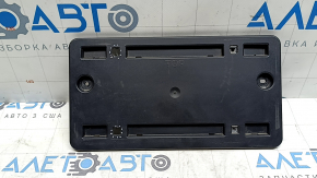 The license plate area of the Audi A3 22-26 trunk lid has a broken mount and scratches