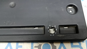 The license plate area of the Audi A3 22-26 trunk lid has a broken mount and scratches