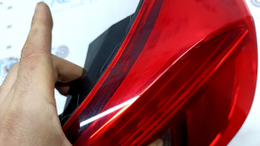 The outer right wing light of a Honda Accord 18-22 is worn, there are cracks under the glass