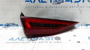 The inner tailgate light, left, Audi A3 22-24, is scuffed