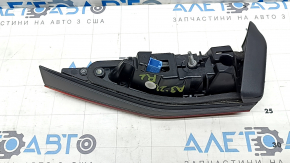 The inner tailgate light, left, Audi A3 22-24, is scuffed