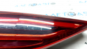 The inner tailgate light, left, Audi A3 22-24, is scuffed