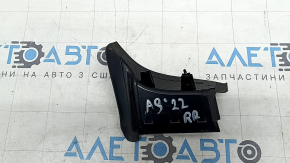The lining of the right outer wing light of the Audi A3 22-26 has broken fasteners