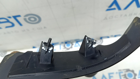 The lining of the right outer wing light of the Audi A3 22-26 has broken fasteners