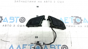 The steering wheel control buttons on the Audi A3 22-26 are chrome