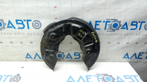 The rear left brake disc cover of the Audi A3 22-26 is dented