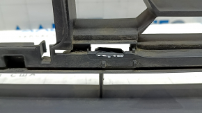 The lower grille of the front bumper of the Audi A3 22-24 is black, the fasteners are broken