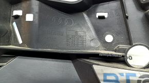 The lower grille of the front bumper of the Audi A3 22-24 is black, the fasteners are broken