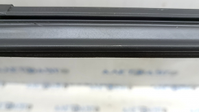 The rear right inner door glass seal for Audi A3 22-26 has scratches, nicks, and abrasions