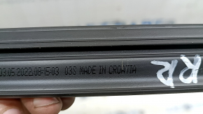 The rear right inner door glass seal for Audi A3 22-26 has scratches, nicks, and abrasions