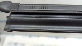 The rear right inner door glass seal for Audi A3 22-26 has scratches, nicks, and abrasions