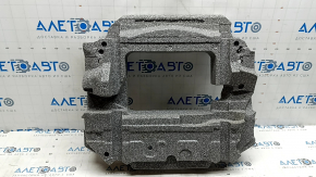 The foam plastic under the spare tire of a Volvo XC60 18-26 is crushed and broken
