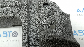 The foam plastic under the spare tire of a Volvo XC60 18-26 is crushed and broken