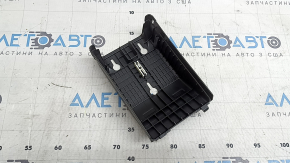 The under-dash fuse box cover for Volvo XC60 18-26 is worn, the fastening is broken, there are scratches
