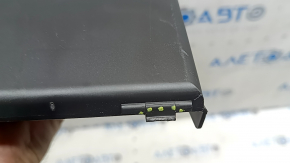 The under-dash fuse box cover for Volvo XC60 18-26 is worn, the fastening is broken, there are scratches