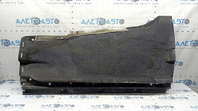 The right underbody protection of the Audi Q5 80A 18-25 is dented and torn