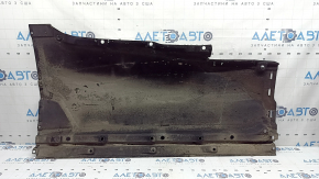 The right underbody protection of the Audi Q5 80A 18-25 is dented and torn