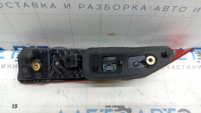The inner light of the right trunk door of Volvo XC60 20-26 is worn, scratches
