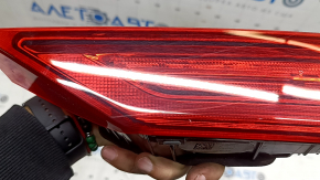 The inner light of the right trunk door of Volvo XC60 20-26 is worn, scratches