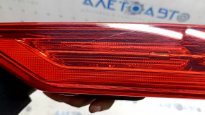 The inner light of the right trunk door of Volvo XC60 20-26 is worn, scratches