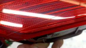 The inner light of the right trunk door of Volvo XC60 20-26 is worn, scratches