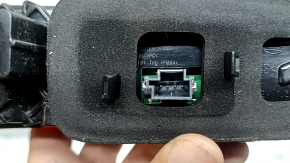 The inner light of the right trunk door of Volvo XC60 20-26 is worn, scratches
