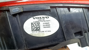 The inner light of the right trunk door of Volvo XC60 20-26 is worn, scratches