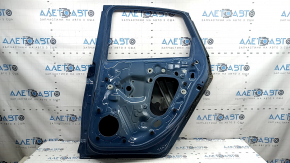 The door is bare, rear right, VW Jetta 19-26, blue LC5D, dented, burned