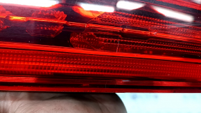 The inner tailgate light, left, Volvo XC60 20-26, is worn and scratched
