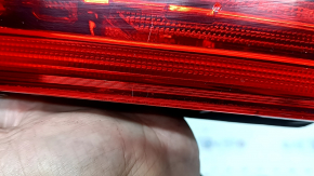 The inner tailgate light, left, Volvo XC60 20-26, is worn and scratched