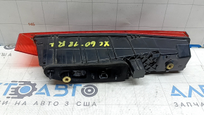 The inner tailgate light, left, Volvo XC60 20-26, is worn and scratched