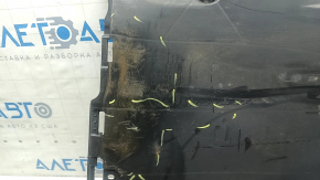 The right underbody protection of the Audi A3 22-26 is dented and worn