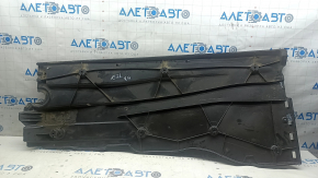 The right underbody protection of the Audi A3 22-26 is dented and worn