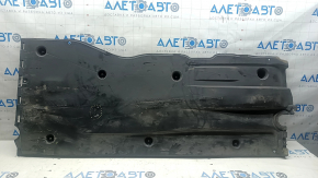 The left underbody protection of the Audi A3 22-26 is dented and worn