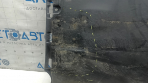 The left underbody protection of the Audi A3 22-26 is dented and worn