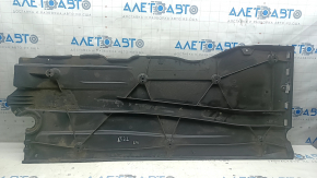The left underbody protection of the Audi A3 22-26 is dented and worn