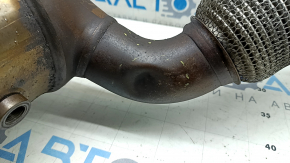 The inlet pipe with the catalytic converter of the Audi A3 22-26 is crushed, the mesh is torn